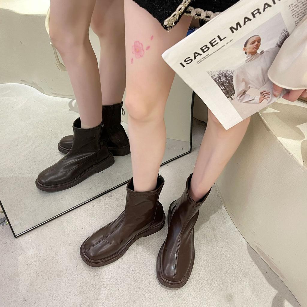 Martin boots spring and autumn new flat bottom round head thin boots with skirt short boots women