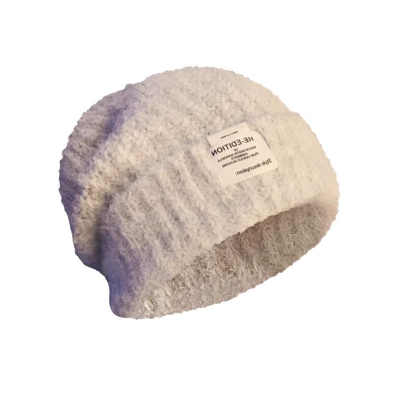 The New Woolen Hat Shows Off Your Face. It's A Trendy Knitted Hat with A Fabric Patch for Warmth Ear Protectors and Headscarves