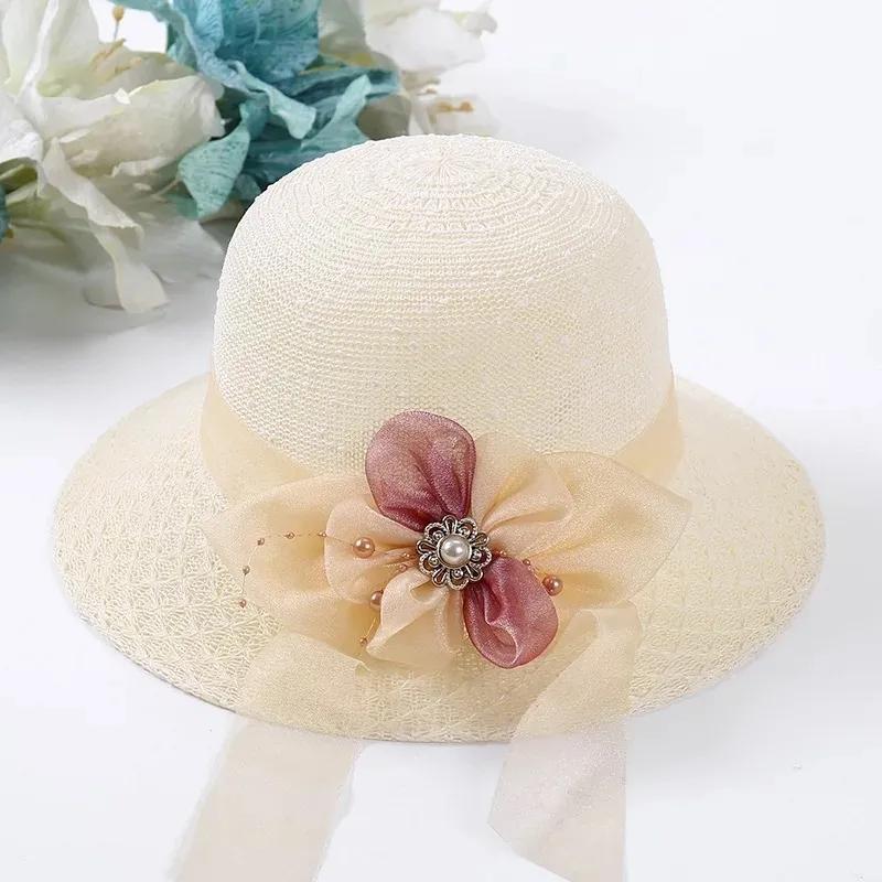 Berretto da sole da donna Fiore estivo Fiocco in nastro Cappello di paglia Protezione solare Scava fuori Vacanza al mare Cappello anti-UV Cappello da sole tutto-fiammifero