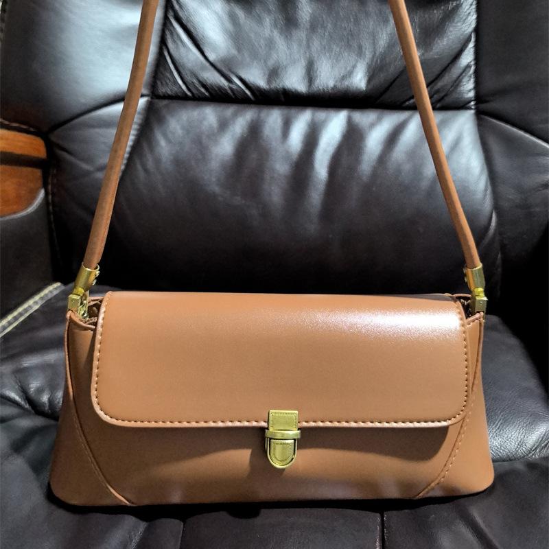 Premium bag texture fashionable retro baguette armpit bag 2 new versatile single shoulder messenger bag tide коричневый