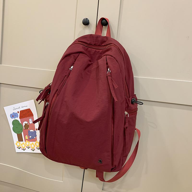Schoolbag new lightweight and simple raw schoolbag Korean version ins college style junior high school college backpack solid color versatile backpack