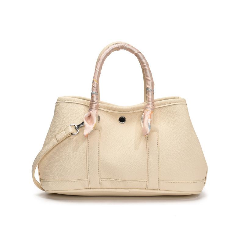 High-end trendy fashion hand-carried bucket bag women 2025 new simple casual shoulder bag small fresh messenger bag