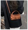 Suede bag women's autumn and winter 2025 new fashion niche design messenger bag matte retro portable pillow bag