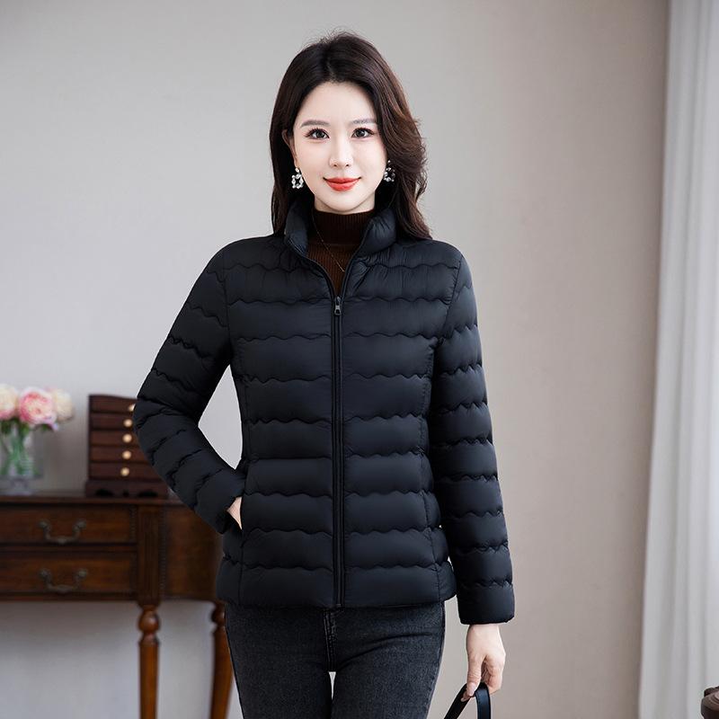 

Женская короткая стеганая ветрозащитная тонкая легкая зимняя куртка XL чёрный