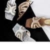 Spot~ Wedge Heel Woven Leather Cool Slippers Women's Summer Outer Wear Temperament Square Head Stepping On Shit Feeling Beautiful One-word Slippers