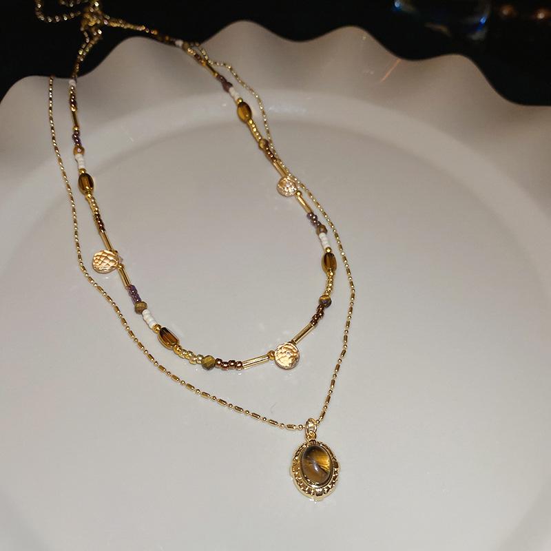 Titanium Steel Sun Necklace with Natural Stone Rice Beads - Retro Ethnic Clavicle Chain, Light Luxury Fashion Accessory