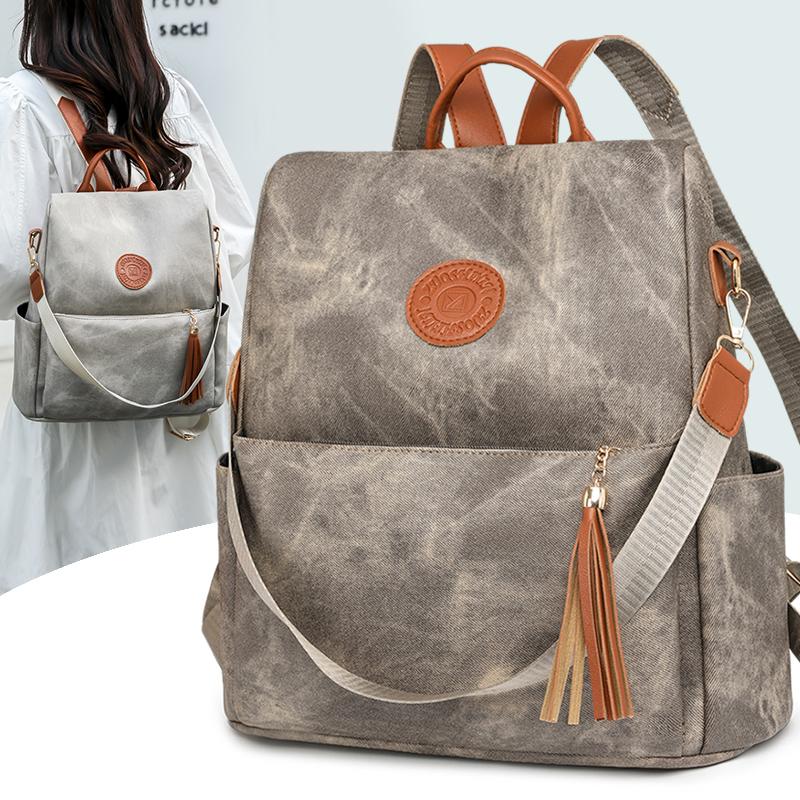 Модный женский рюкзак с кисточками и защитой от краж из искусственной кожи — фото 5