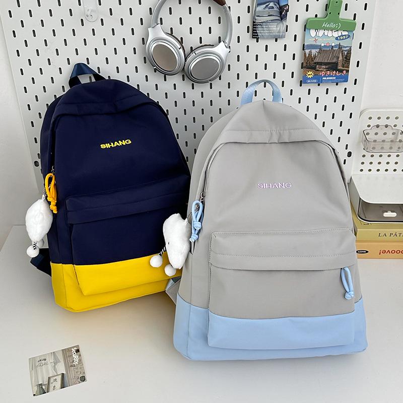 Korean version of small fresh backpack fashionable large capacity high value backpack lightweight boys and girls junior high school student schoolbag