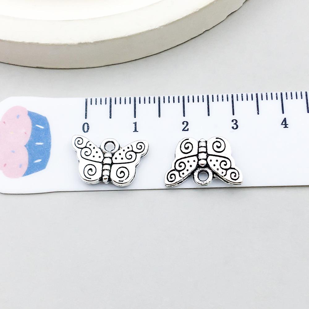 Set di 100 Ciondoli Gatto Farfalla Luna Argento Antico per Braccialetti e Collane Fai da Te