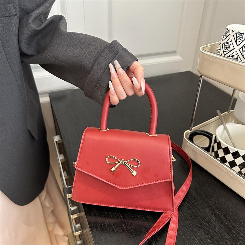 Premium sense portable small square bow bag women's 2025 new fashion shoulder bag versatile messenger bag trend