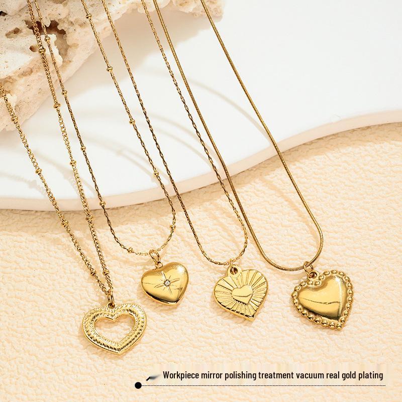 Stainless Steel Gold-Plated Love Heart Necklace with Inlaid Diamonds