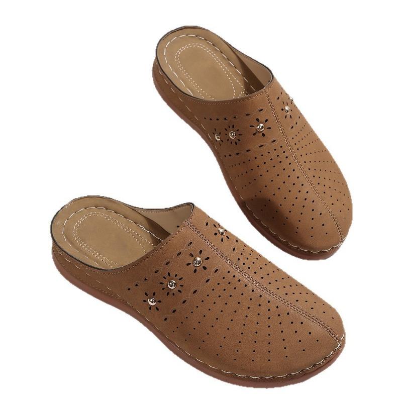 New women's large-size toe hollow rivet flower girl hollow slope heel thick bottom large-size bag head slippers