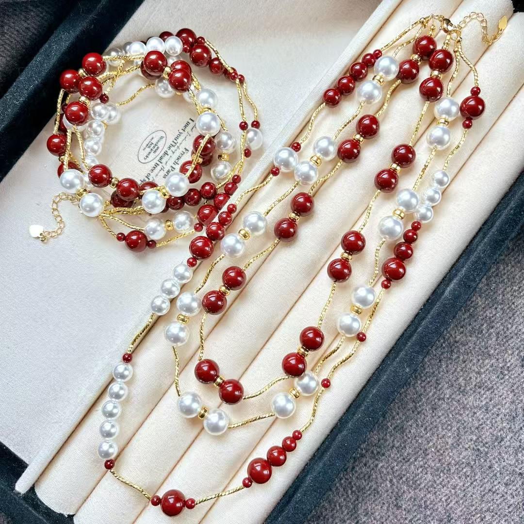 

Vintage High-Quality Faux Crystal Pearl Ankara Red Pearl Multi-Layer Necklace Sweater Chain