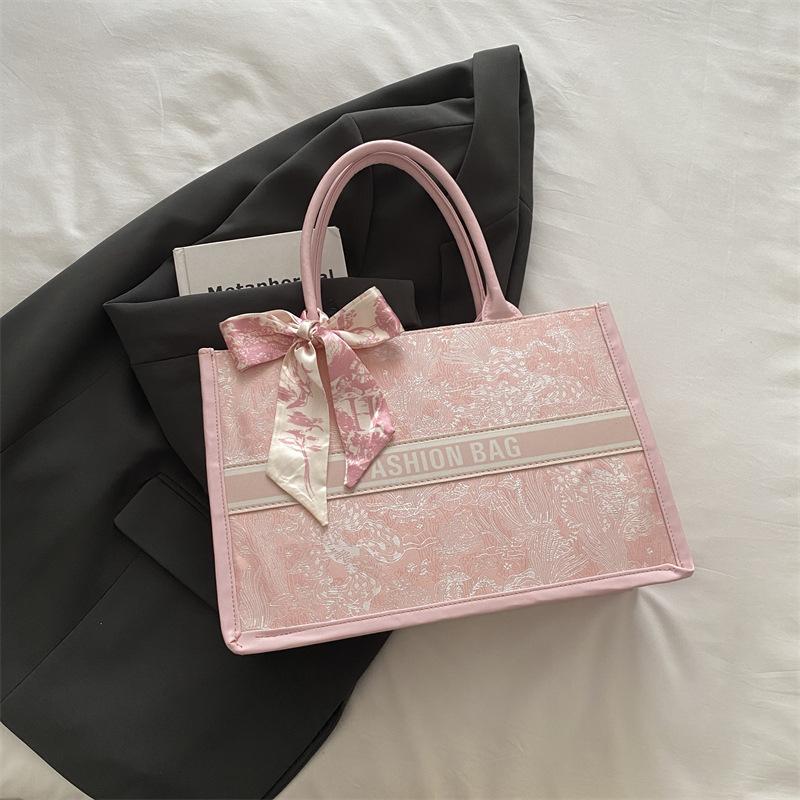 

Модная женская сумка большой вместимости 2025 года в зарубежном стиле, на плечо, подмышку, универсальная портативная сумка-тоут розовый