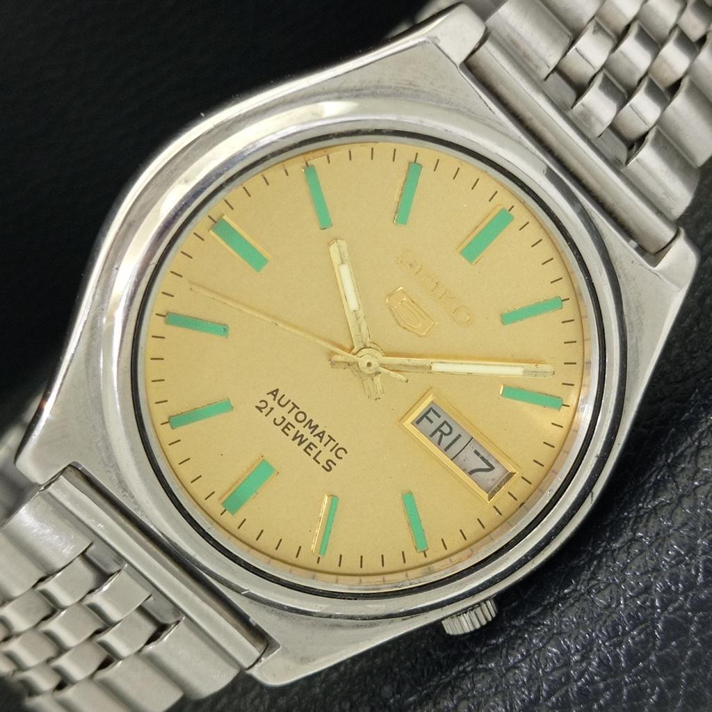 GENUINE VINTAGE SEIKO 5 AUTOMATIC JAPAN MENS GOLDEN COLOR DIAL WATCH A702604-1 R209-a702604