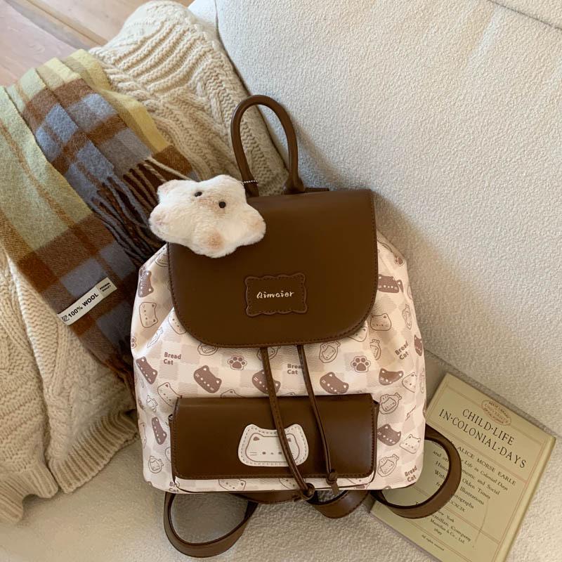 

Универсальный мультяшный школьный рюкзак для студентов: Женский легкий рюкзак для поездок на работу большой вместимости с клапаном и затягивающимся шнурком. One Size кофейный