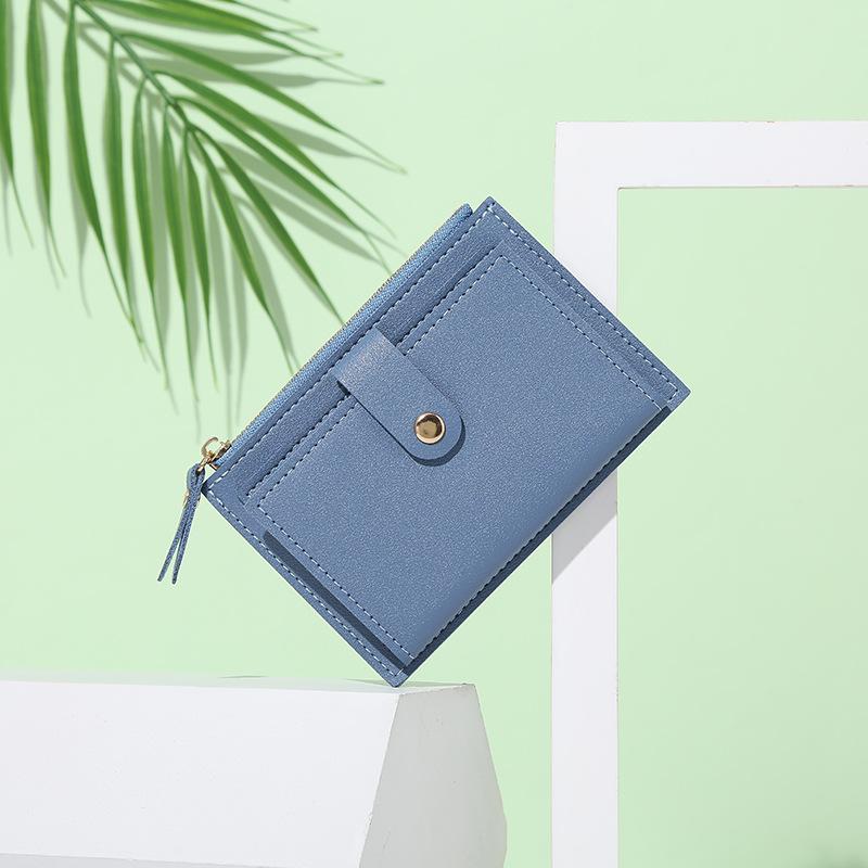 

Slim & Stylish Women s Wallet with Snap Button Zipper - Lightweight, Portable Bifold Design синій