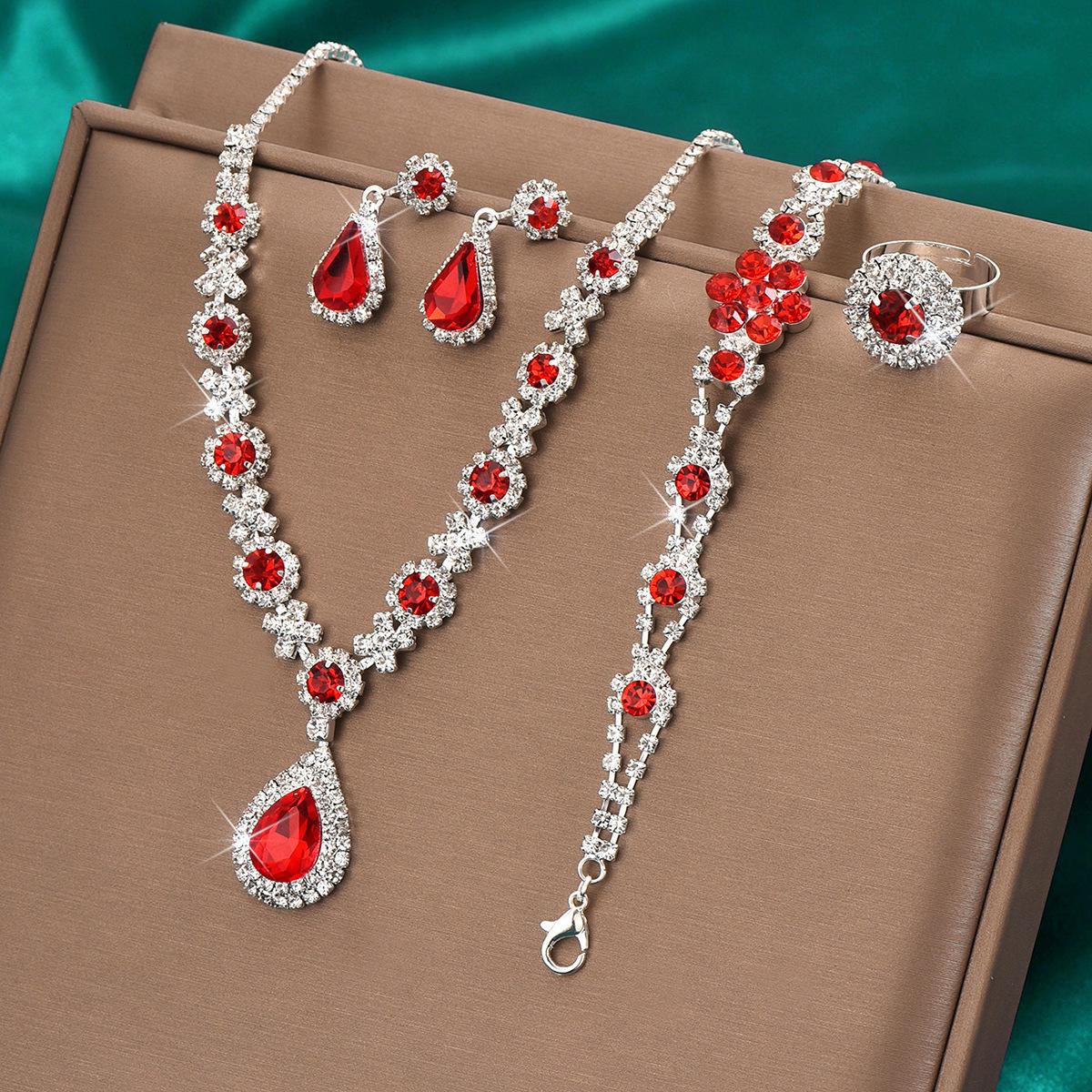 

2025 Высококлассный европейский и американский модный ювелирный набор с кристаллами и драгоценными камнями: Ожерелье, Серьги, Браслет, Кольцо.