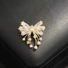 Temperament Sweet Stone-inlaid Exquisite Small Bow Gold Small Pin Fixed Versatile Anti-light Small Brooch Women's