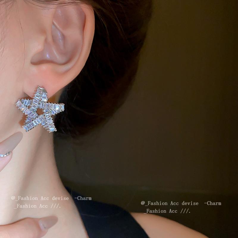 Silver needle zircon star hollow earrings, European and American exaggerated design studs, niche cold wind temperament earrings