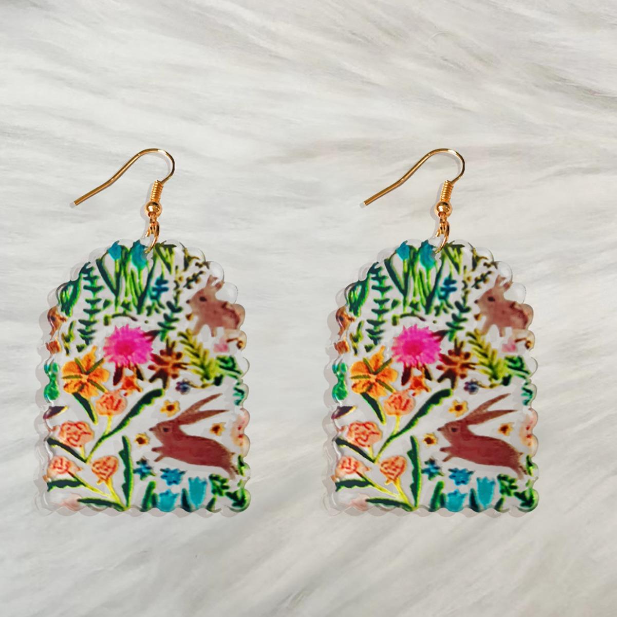 

Semicircular earrings, small flowers, grass, rabbit printing, transparent acrylic material, elegant, fashionable and exquisite різнокольоровий