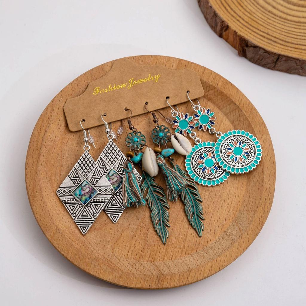 Exaggerated Ethnic Style Round Hollow Earrings, Retro Conch Sunflower Feathers Fringed Ear Hook Women