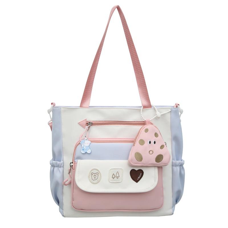 Korean version ins exquisite and cute contrasting colors large-capacity student tutoring bag literary and small fresh women's shoulder messenger bag