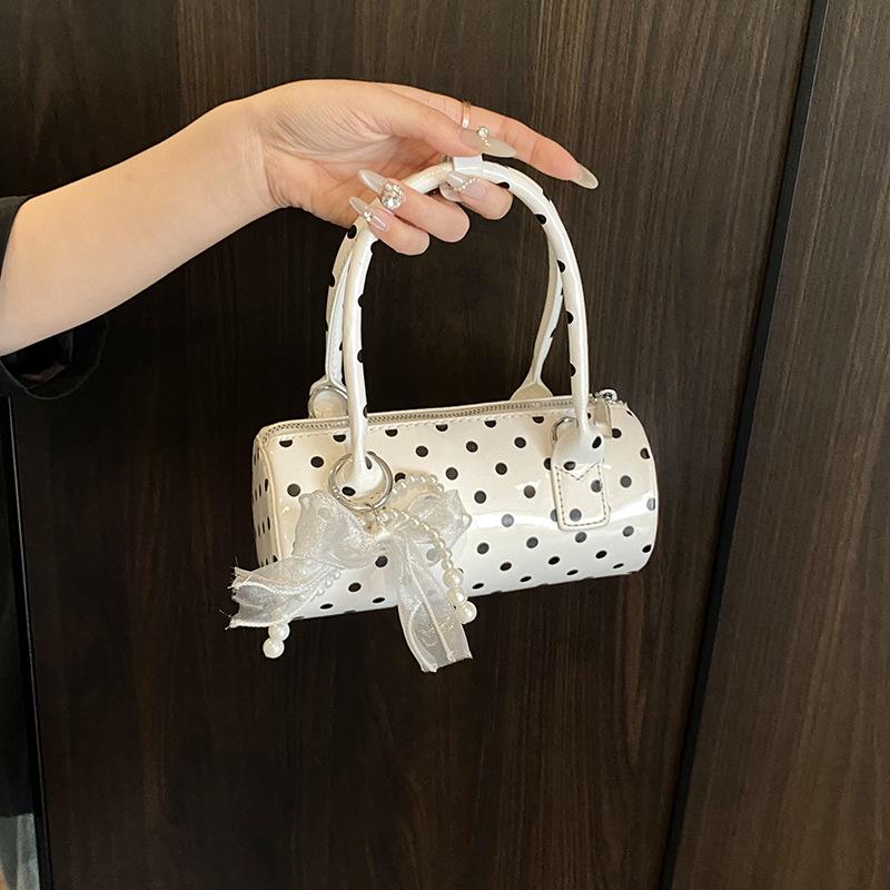 Niche polka dot bag 2025 new Mori sweet fashion bow foreign style versatile portable shoulder cylinder bag