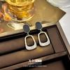 Elegant Gold-Plated Black Zircon Stud Earrings - Niche Design for a Luxurious Fashion Statement