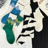 2024 INS Style Non-Slip Couple Mid-Calf Cotton Socks, Sweat-Absorbent & Versatile for All Seasons
