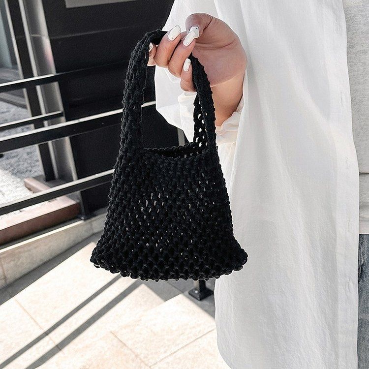 Ausgehöhlte Netzbeutel Handtasche Handgewebte Baumwollseil Tasche Handgelenktasche Strandurlaub Eimertasche