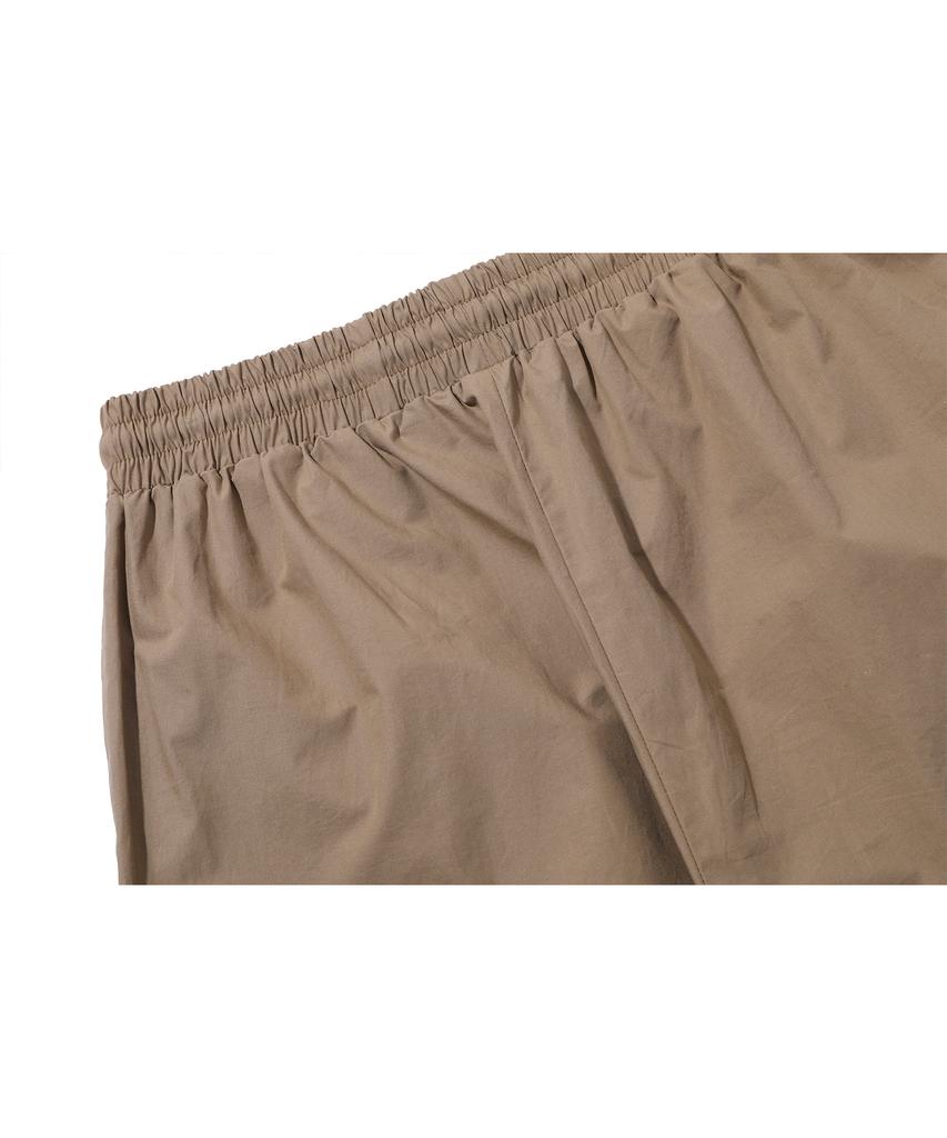 CPGN STUDIO Weite Cargohosen Beige