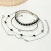 European & American Fashion Green Snake Diamond Bangle Set: Women's 4-Piece High-End Metal Jewelry with Elastic Design.