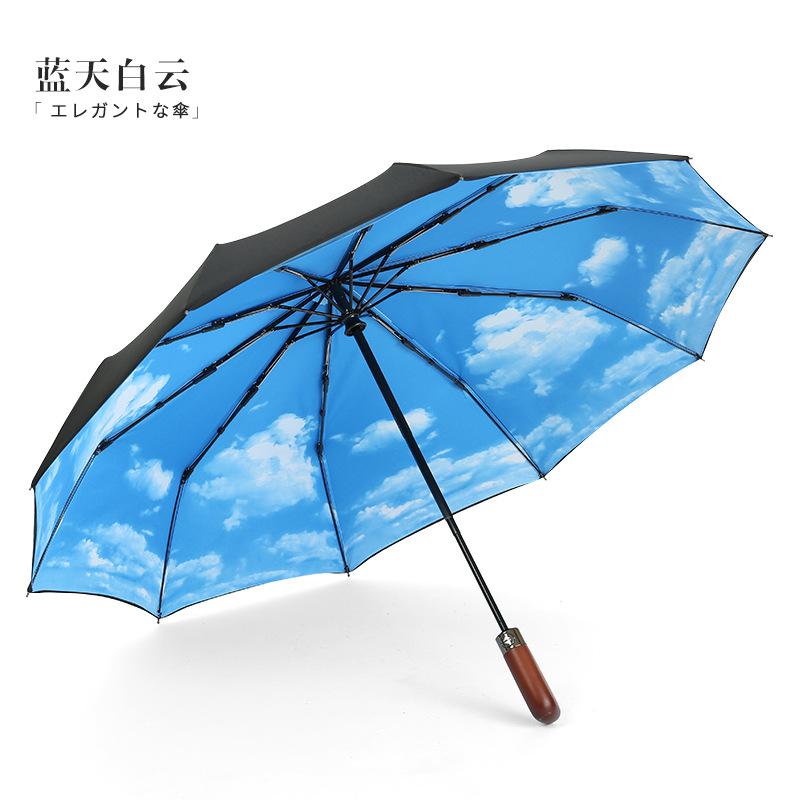 Fully automatic 10-bone wind-resistant solid wood handle lettering three-fold men's umbrella umbrella plus umbrella