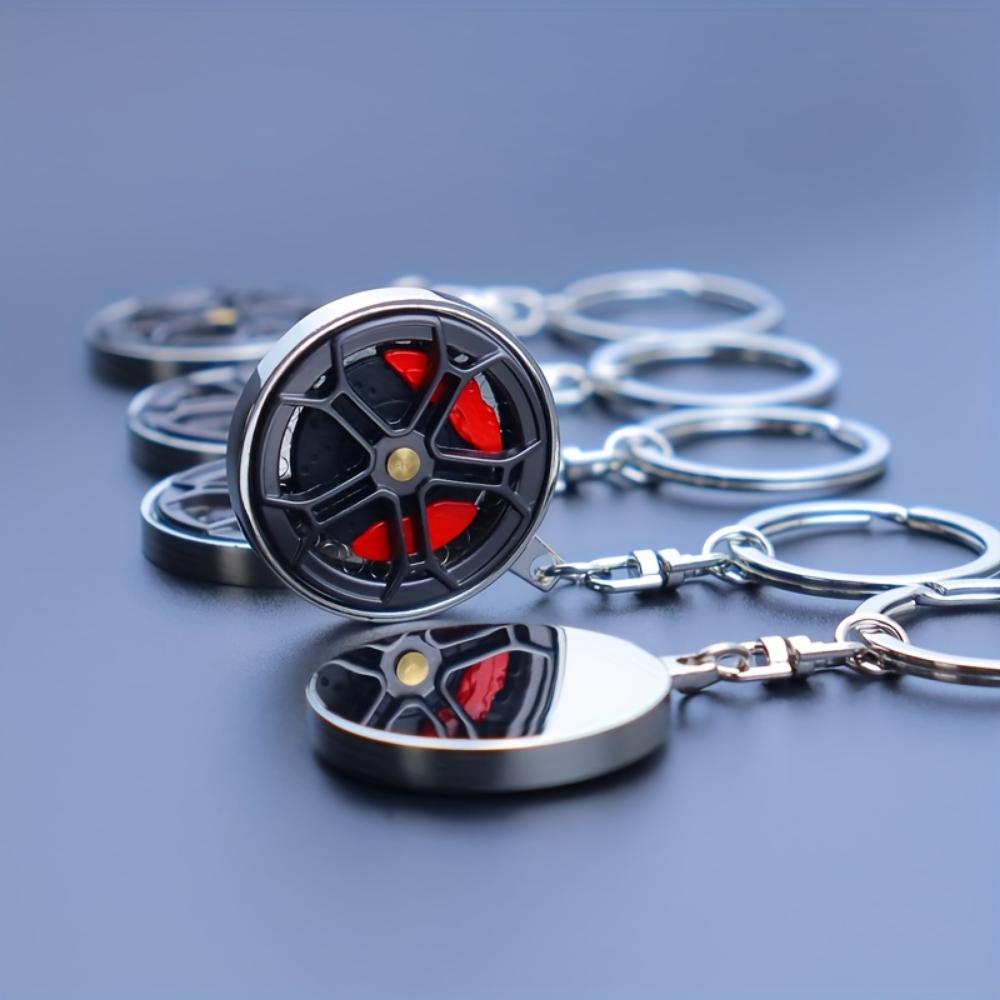 Metallbremsradnabe drehen integrierte Pistole schwarzer Schlüsselanhänger Weihnachtsgeschenk Mercedes-Benz Radnaben-Bremssattel-Schlüsselanhänger