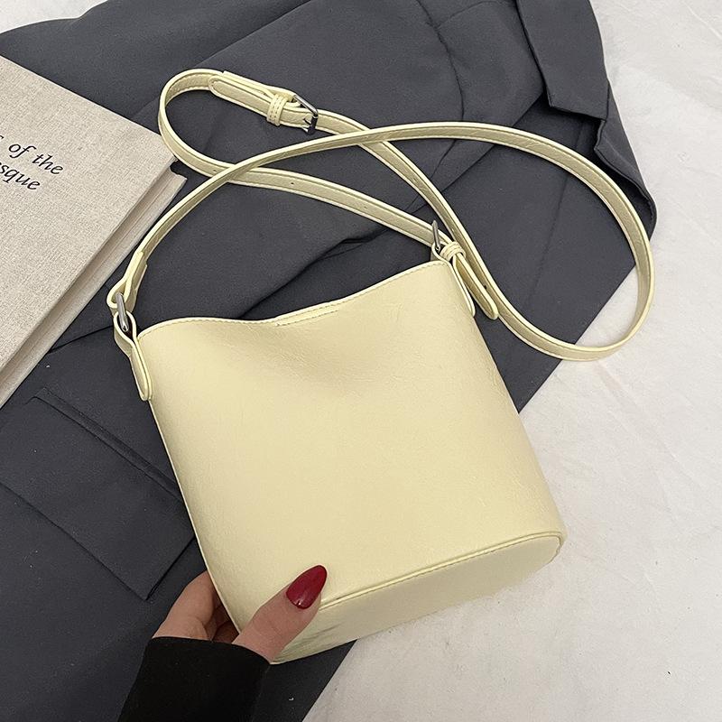 Wholesale Hot Sale Korean Simple Solid Color High-end Bucket Bag Fashionable Versatile Small Fresh Commuter Messenger Mother Bag