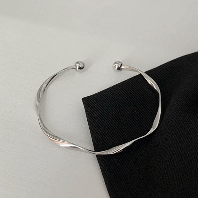

Korean-Style Matte Open Cuff Bracelet: Water Wave Pattern, Twisted Surface, Minimalist Design for Women серебряный
