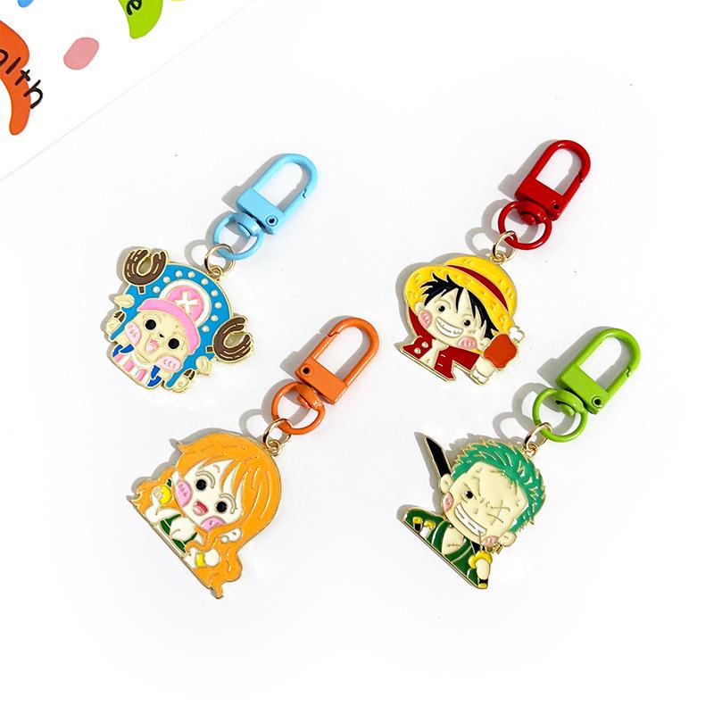 One Piece Keychain: Luffy & Nami Metal Earphone Bag Pendant