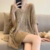 Hollow knitted sweater women's summer new design sense niche sexy perspective loose lazy wind beach sunscreen blouse