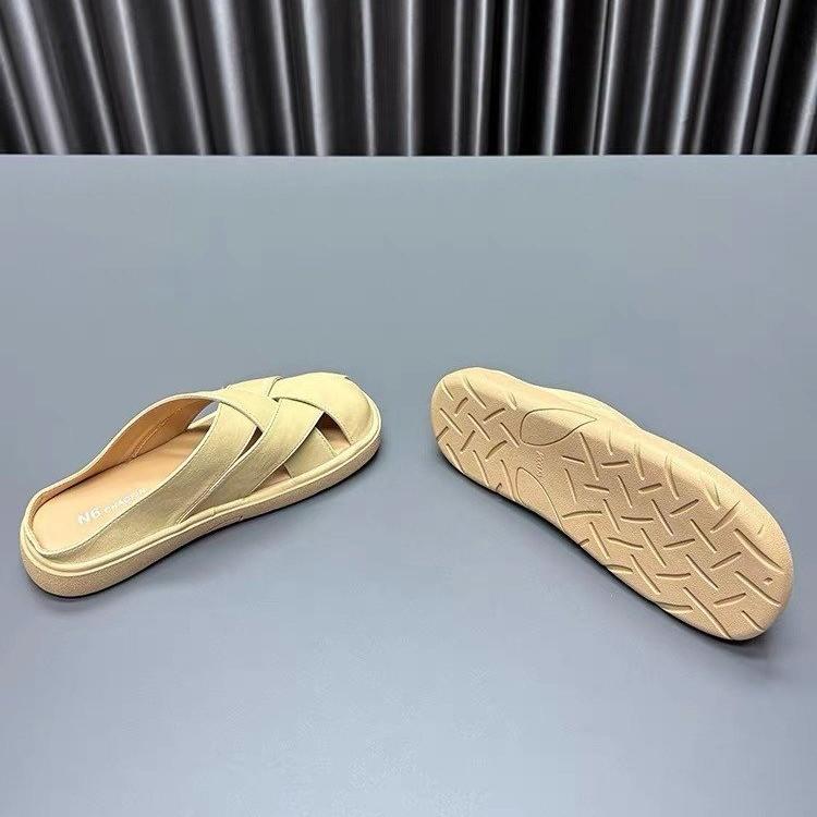 Woven French bag head slippers women's 2025 summer new flat bottom hollow fashion high sense with skirt cool slippers