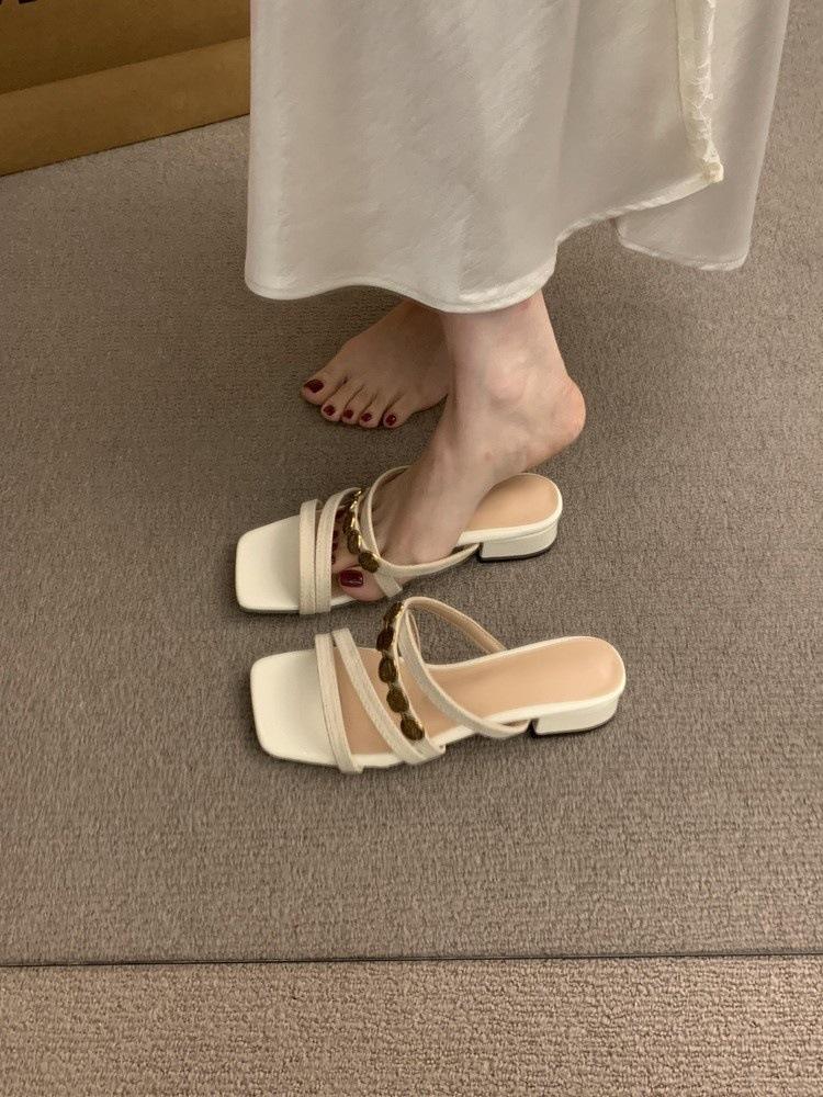 

Thick heel cool slippers women s summer outer wear 2025 new models with skirts versatile, not tired, comfortable Roman shoes 42