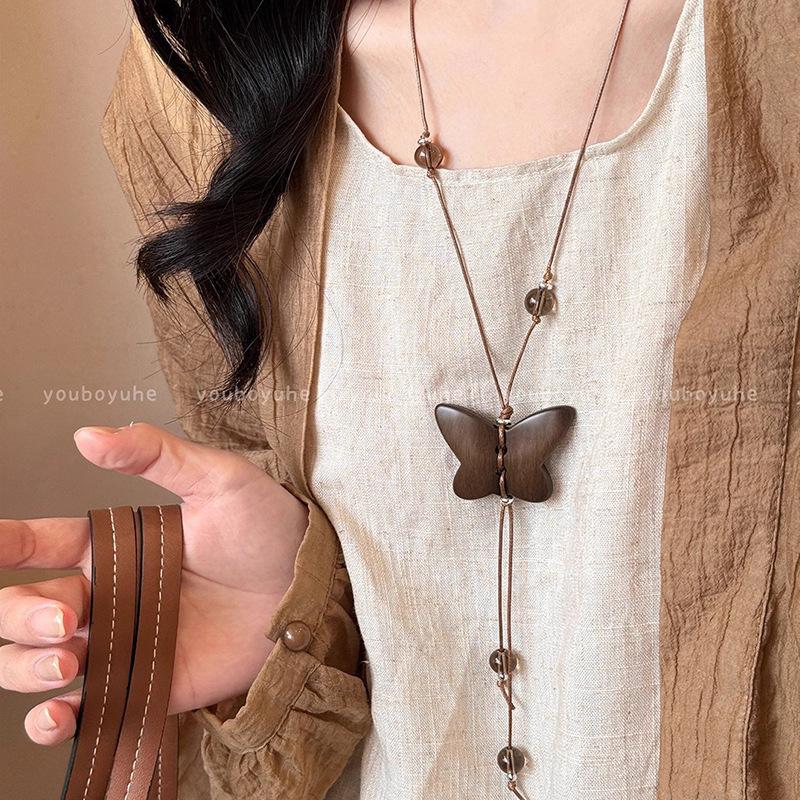 New Chinese Zen Wooden Butterfly Necklace Women s Niche Design Sense Beaded Long Sweater Chain Daily