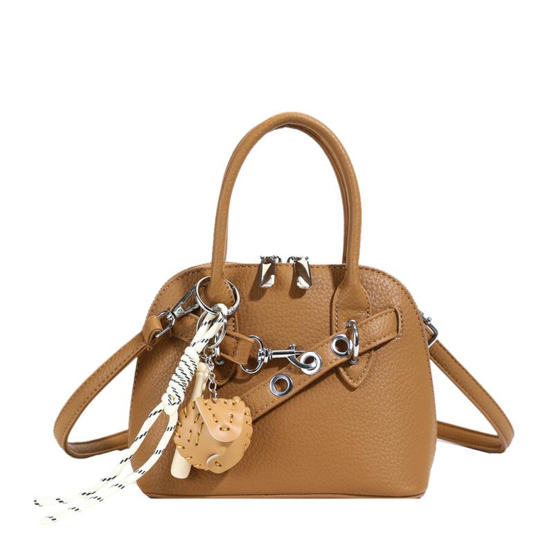 

2025 wholesale personalized versatile commuter portable shell bag simple fashionable foreign style daily messenger women s bag коричневый