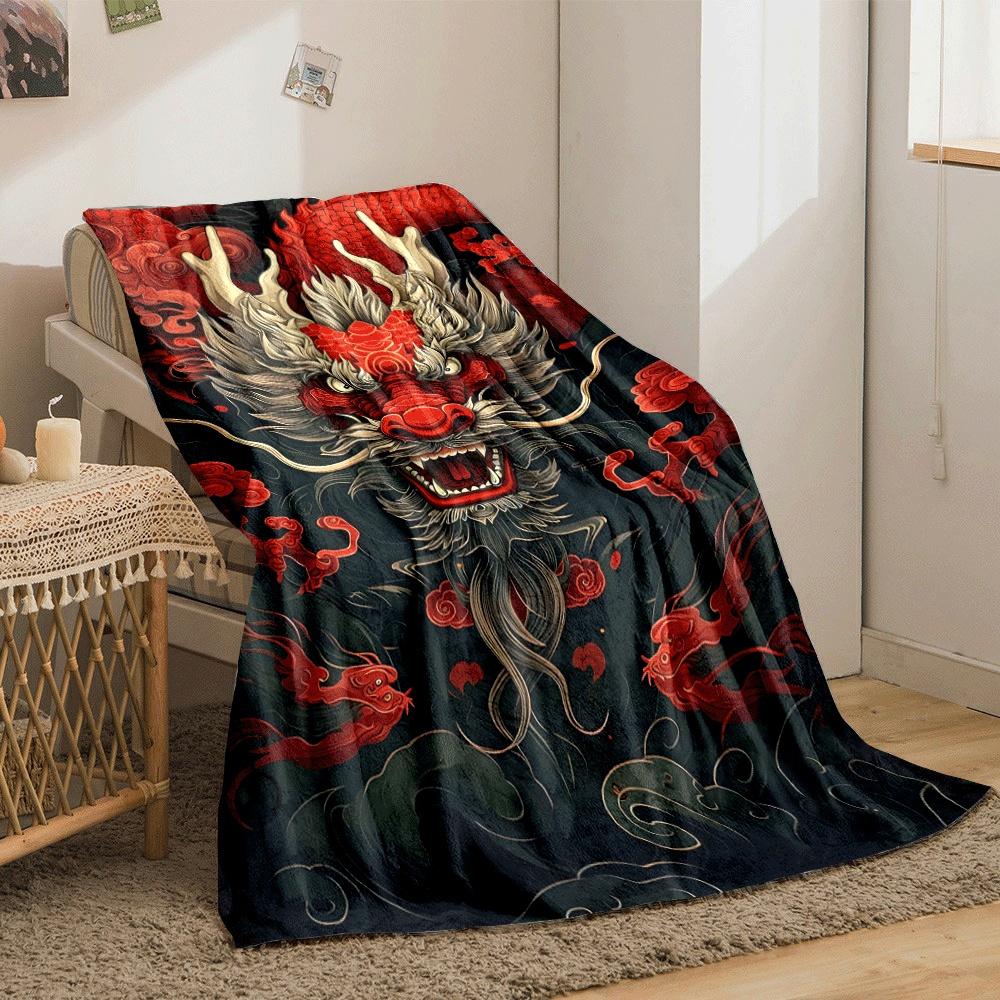 Fiery dragon head with horns, surrounded by red scales and swirling clouds. for all seasons blanket lunch break throw gift