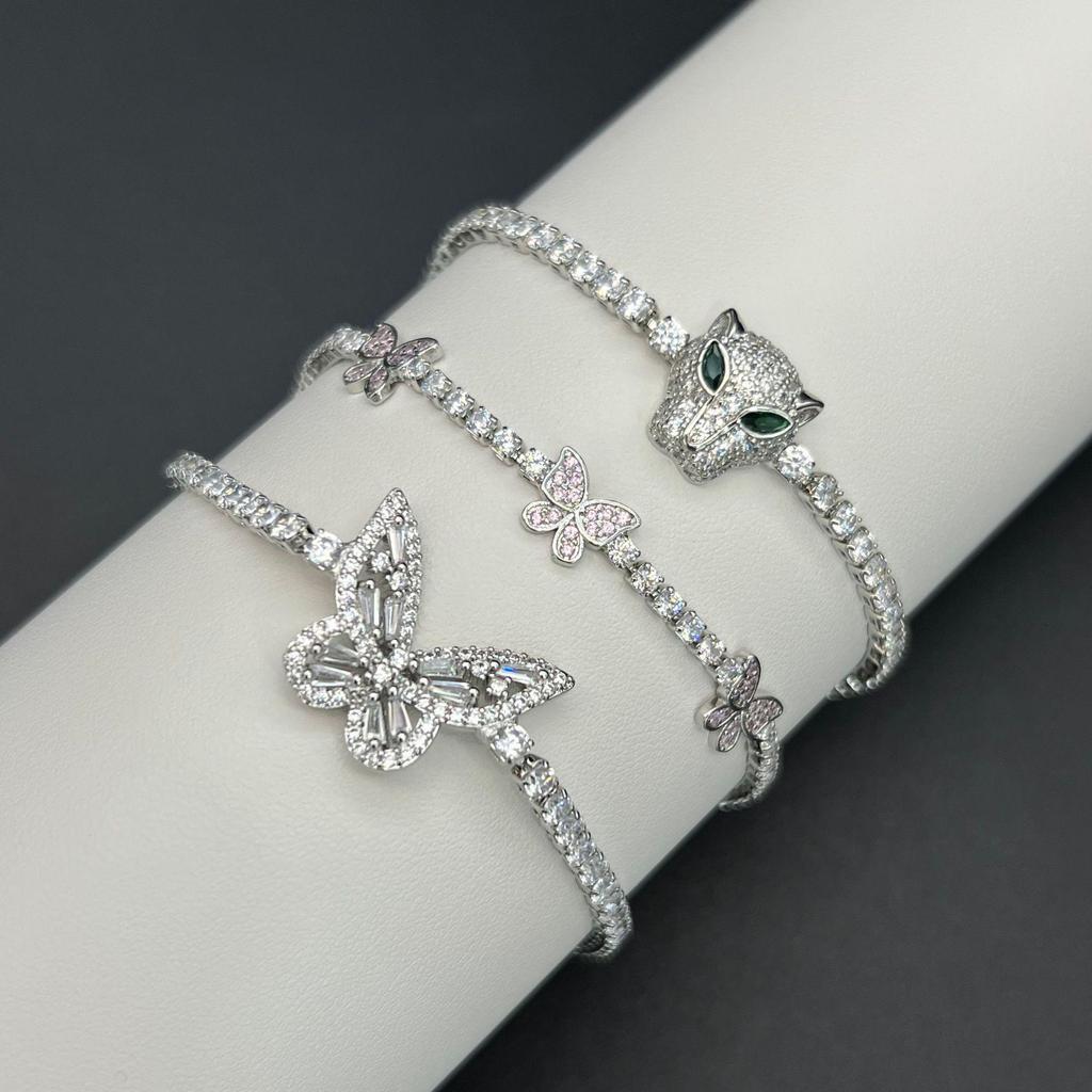 Luxuriöses Damenarmband mit Schmetterlings-Zirkonia und Leopardenkopf - Funkelnder High-End-Stil