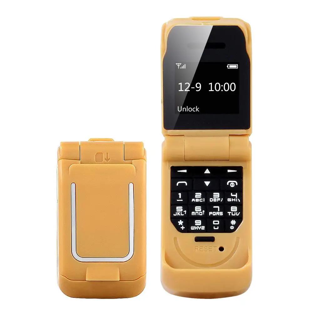 0,66" Mini Flip Mobiltelefon Minste klapptelefon FM Trådløs Bluetooth 3.0 Oppringer Handsfree Øretelefon Enkelt SIM-kort telefon
