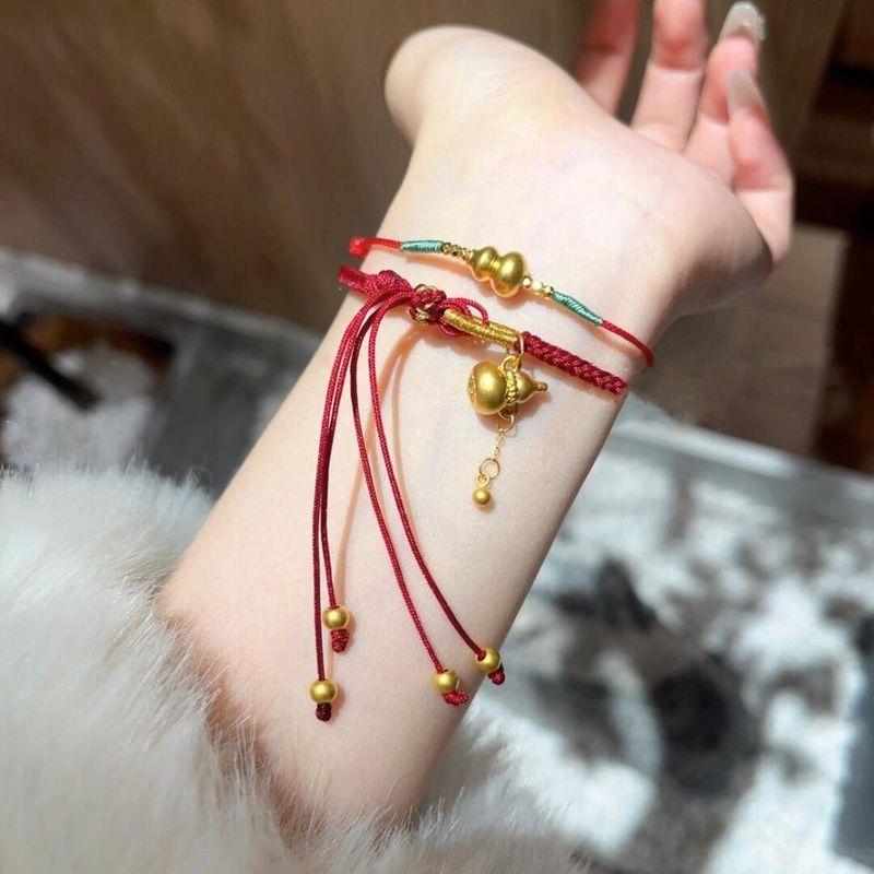 

Браслет-плетенка с кисточкой-горлянкой Фу Лу Шоу Си Национальный стиль, Новый китайский стиль, Красная веревочка-оберег года судьбы, Новогодний подарок Fu Lu Shou Xi Red Hand Rope