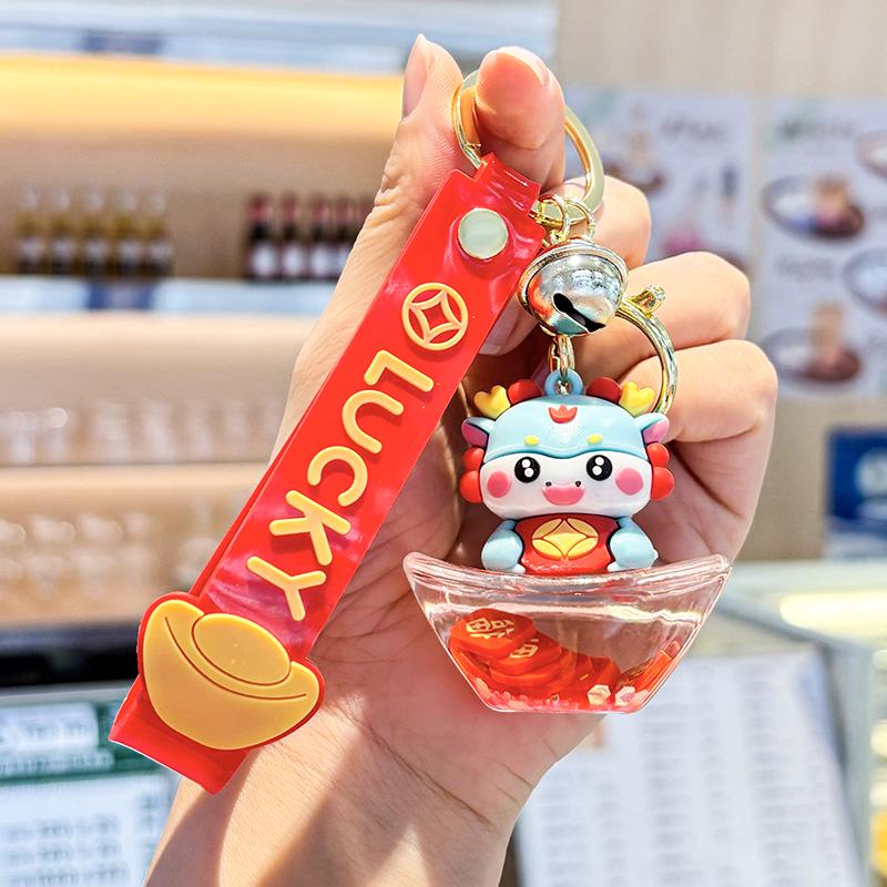 Akrylový přívěsek na klíče s tekutým pískem a obsahem oleje - Perfektní malý dárek na tašku nebo do auta.