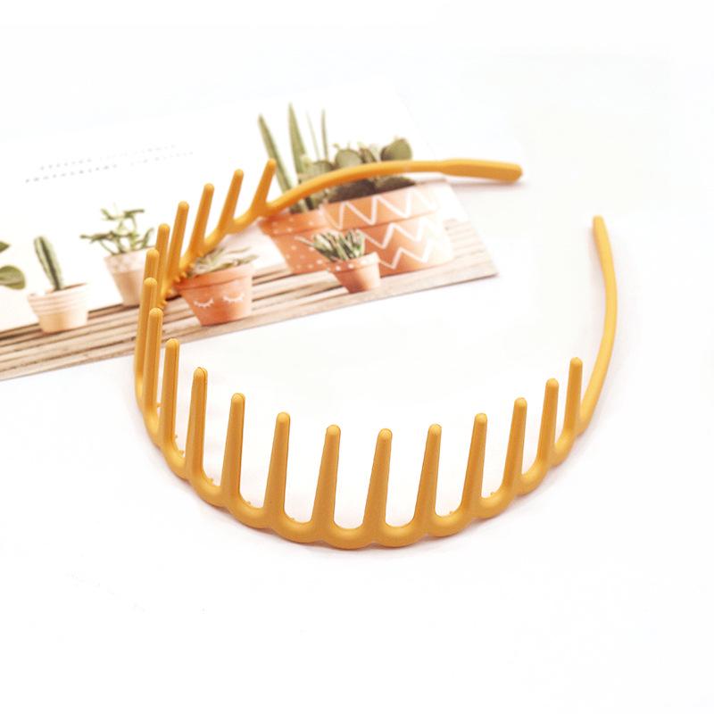 Buntes, wellenförmiges koreanisches Zahnkamm-Haarband - Rutschfest, schonend zum Haar, Bequemer Sitz, Ideal zum Bändigen von Babyhaaren.