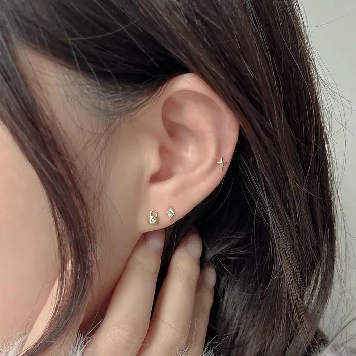 14k flash light cubic piercing